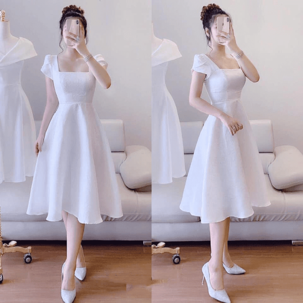Đầm trắng xòe vải bố thái tay con