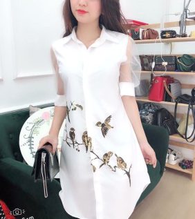 Đầm sơmi trắng in họa tiết chim tay phồng